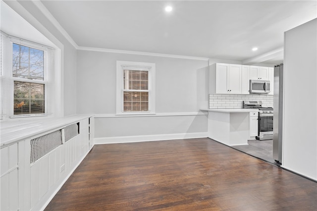 unfurnished dining area featuring crown molding and dark hardwood / wood-style floors