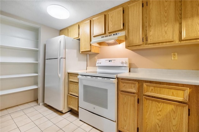 kitchen featuring white appliances, light countertops, under cabinet range hood, and light tile patterned floors