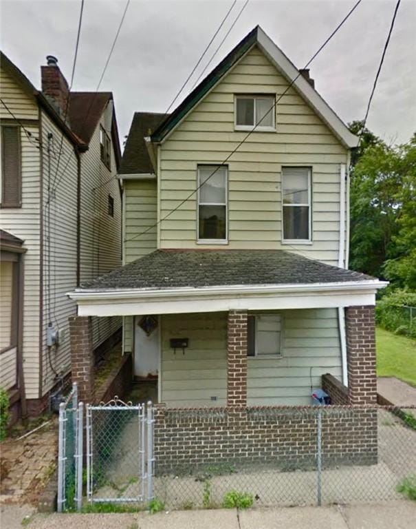 121 Watkins Ave, Wilmerding, PA 15148 - view of front of house featuring a gate