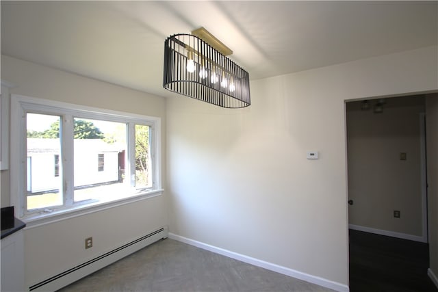 spare room featuring a baseboard radiator