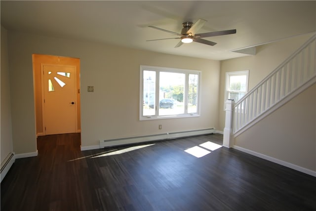 unfurnished living room with ceiling fan, baseboard heating, and dark hardwood / wood-style flooring