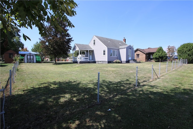 view of yard with a storage unit