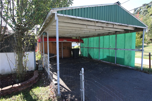 view of parking / parking lot with a carport