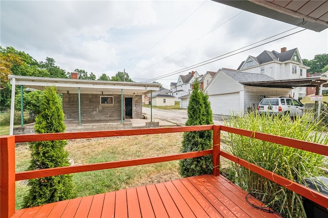 deck featuring a carport