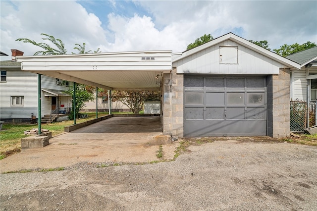 garage with a carport