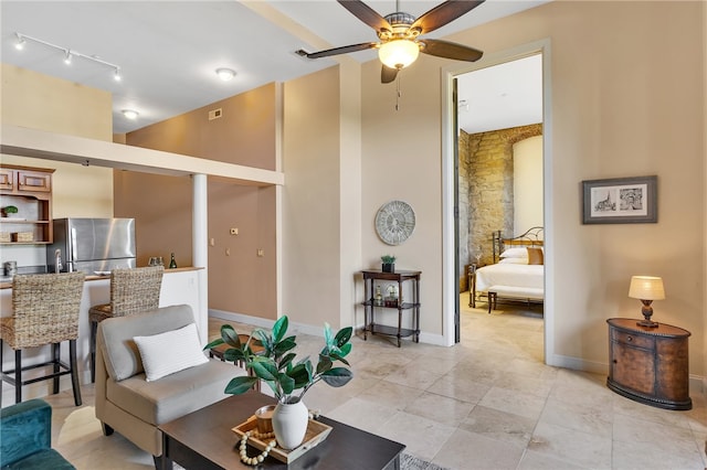 living room featuring ceiling fan