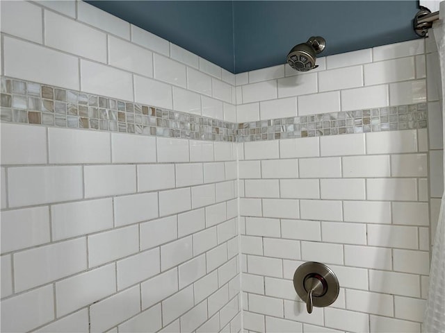 room details with a tile shower