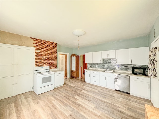 kitchen with light hardwood / wood-style flooring, white electric stove, sink, and stainless steel dishwasher