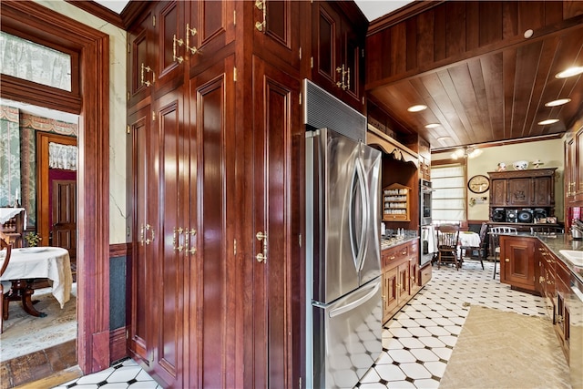 kitchen featuring ornamental molding, appliances with stainless steel finishes, and wooden ceiling