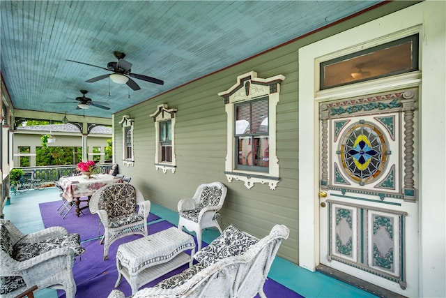 view of patio / terrace featuring covered porch and ceiling fan