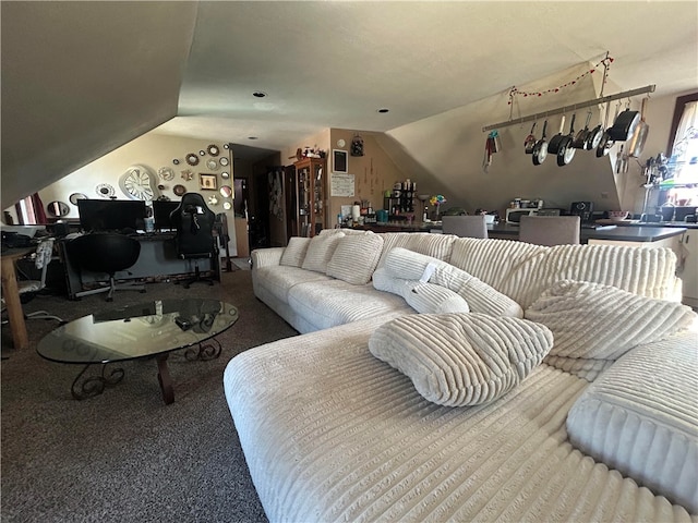 carpeted living room with lofted ceiling