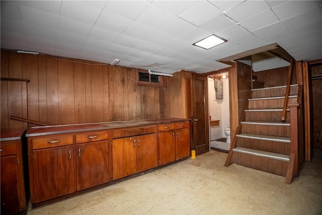 314 Lunn Blvd, Farrell, PA 16121 - finished basement with stairs, wood walls, and light floors