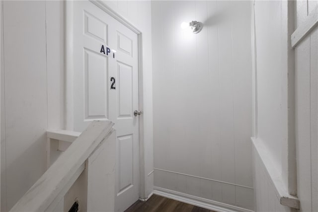 entryway with dark wood-type flooring