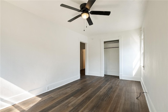 unfurnished bedroom featuring a closet, ceiling fan, and dark hardwood / wood-style floors