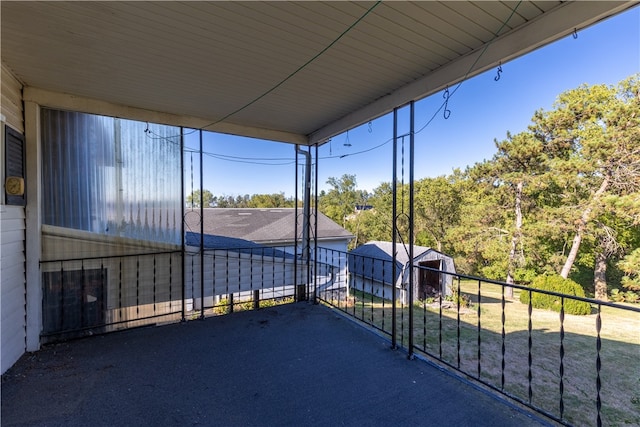 view of patio featuring a balcony