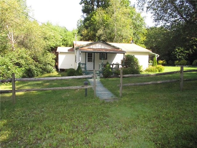 view of front of home with a front yard