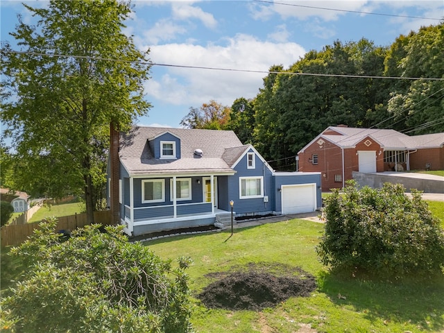 cape cod home featuring a front lawn, covered porch, and a garage