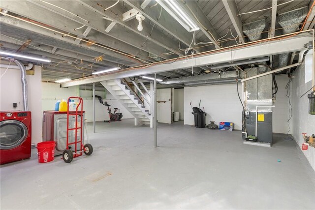 17 Long St, Hanover Twp Wsh, PA 15021 - unfinished below grade area with washer / clothes dryer, stairs, and heating unit