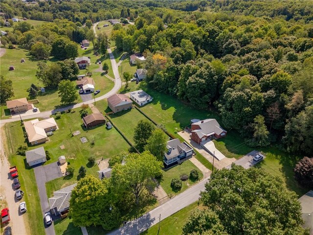 17 Long St, Hanover Twp Wsh, PA 15021 - aerial view of property and surrounding area with a heavily wooded area and nearby suburban area