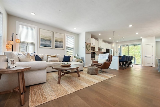 409 Spruce Ln, North Strabane, PA 15317 - living room featuring wood finished floors and recessed lighting