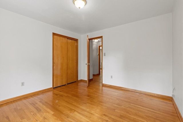 empty room with light wood-type flooring