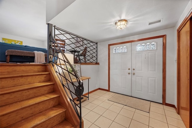 view of tiled entrance foyer