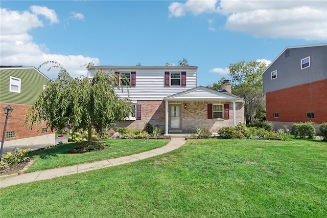 view of front of property with a front yard