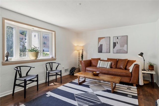 living room featuring dark hardwood / wood-style flooring