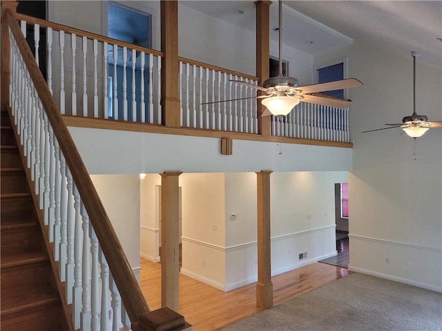 629 Euclid Ave, Grove City Boro, PA 16127 - stairs with ceiling fan, a towering ceiling, ornate columns, baseboards, and wood finished floors