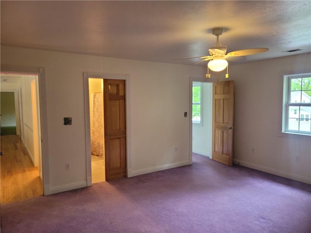 629 Euclid Ave, Grove City Boro, PA 16127 - unfurnished bedroom with carpet, baseboards, ensuite bath, and ceiling fan