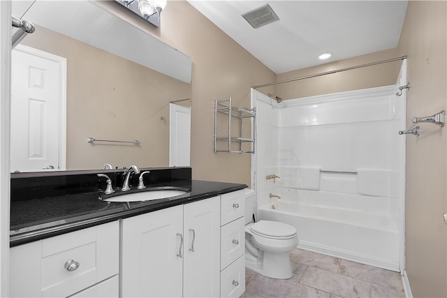 full bathroom with shower / bathtub combination, tile patterned flooring, toilet, and vanity