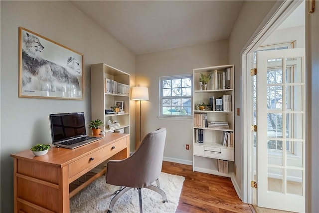 office area with hardwood / wood-style flooring