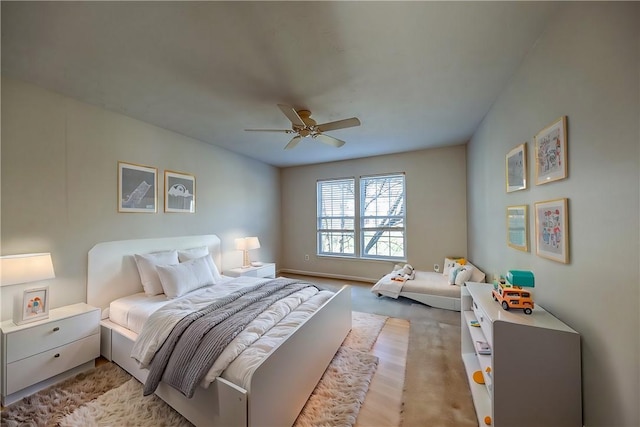 carpeted bedroom with ceiling fan