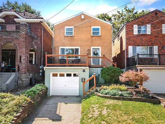 view of front of home featuring a balcony and a garage