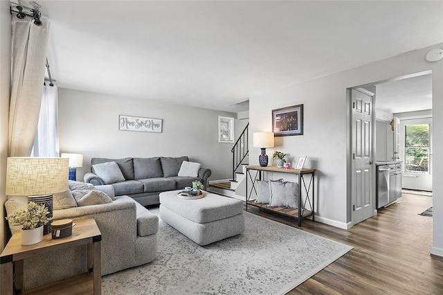 living room with dark wood-type flooring