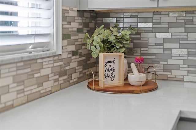 interior details featuring backsplash