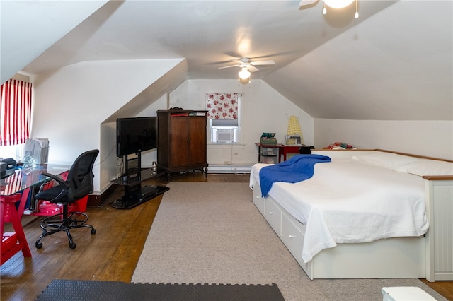 bedroom featuring baseboard heating, ceiling fan, wood-type flooring, and vaulted ceiling