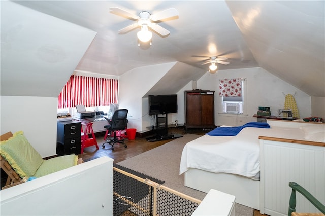 bedroom with lofted ceiling, dark wood-type flooring, ceiling fan, and multiple windows