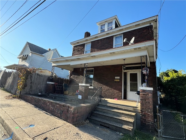 view of front facade featuring covered porch