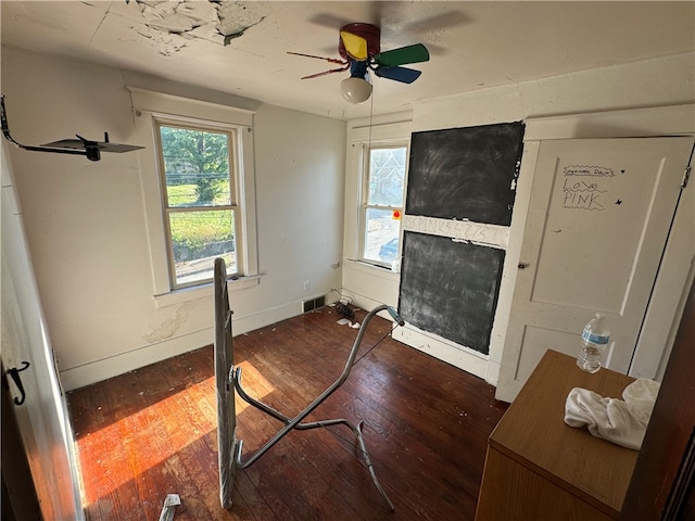 bedroom featuring ceiling fan and hardwood / wood-style flooring