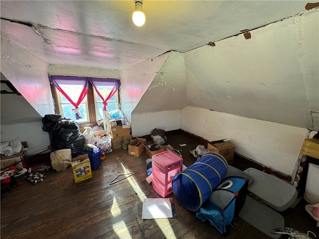 bonus room featuring vaulted ceiling and hardwood / wood-style floors