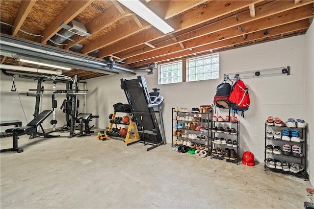 workout area featuring concrete floors