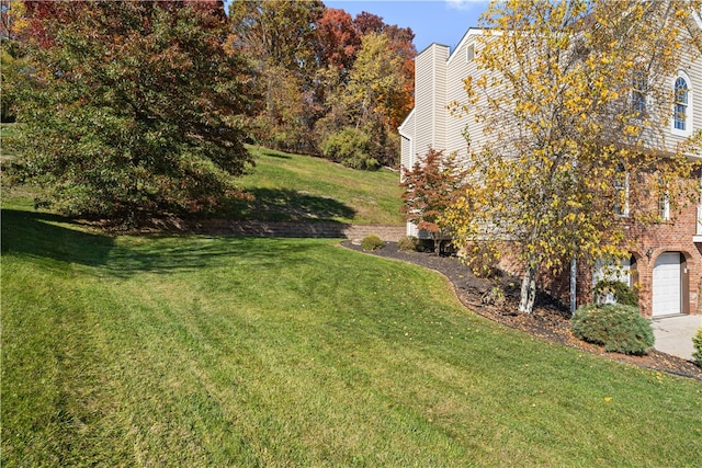 view of yard featuring a garage