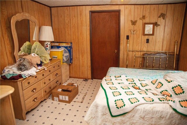 bedroom with wooden walls