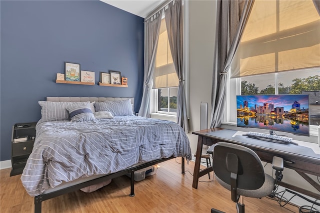 bedroom with light hardwood / wood-style floors