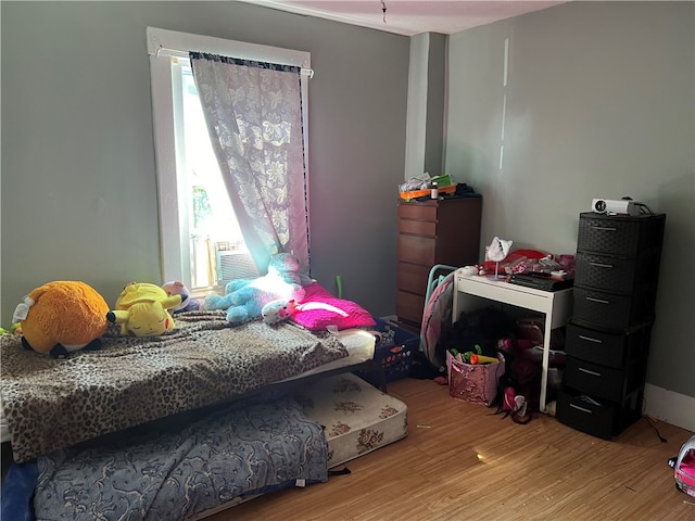 bedroom featuring light wood-type flooring