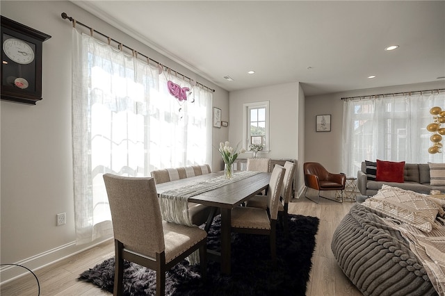 dining room featuring light hardwood / wood-style floors