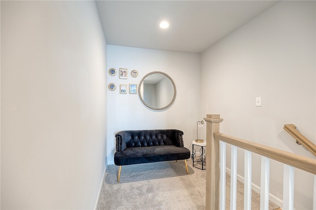 living area with carpet