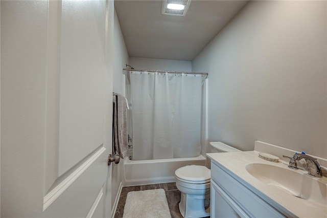 full bathroom featuring vanity, toilet, shower / tub combo with curtain, and hardwood / wood-style flooring