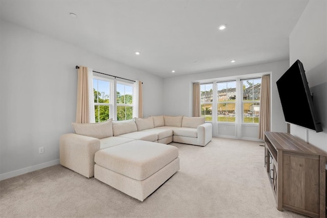 living room featuring light colored carpet